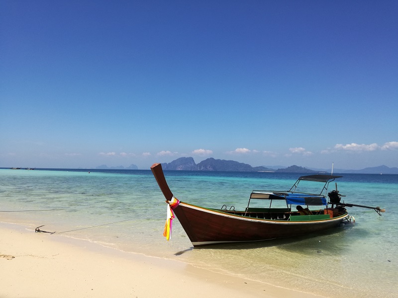Boat ashore on Koh Chang beach